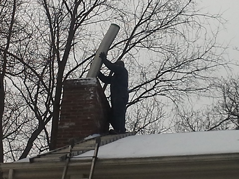 Absolute Chimney & Fireplace Restoration offering chimney services in Boston