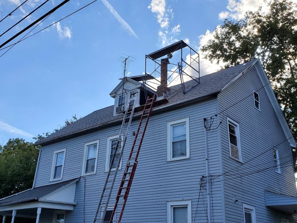 Custom Roofing Chimney Service offering chimney services in Vernon