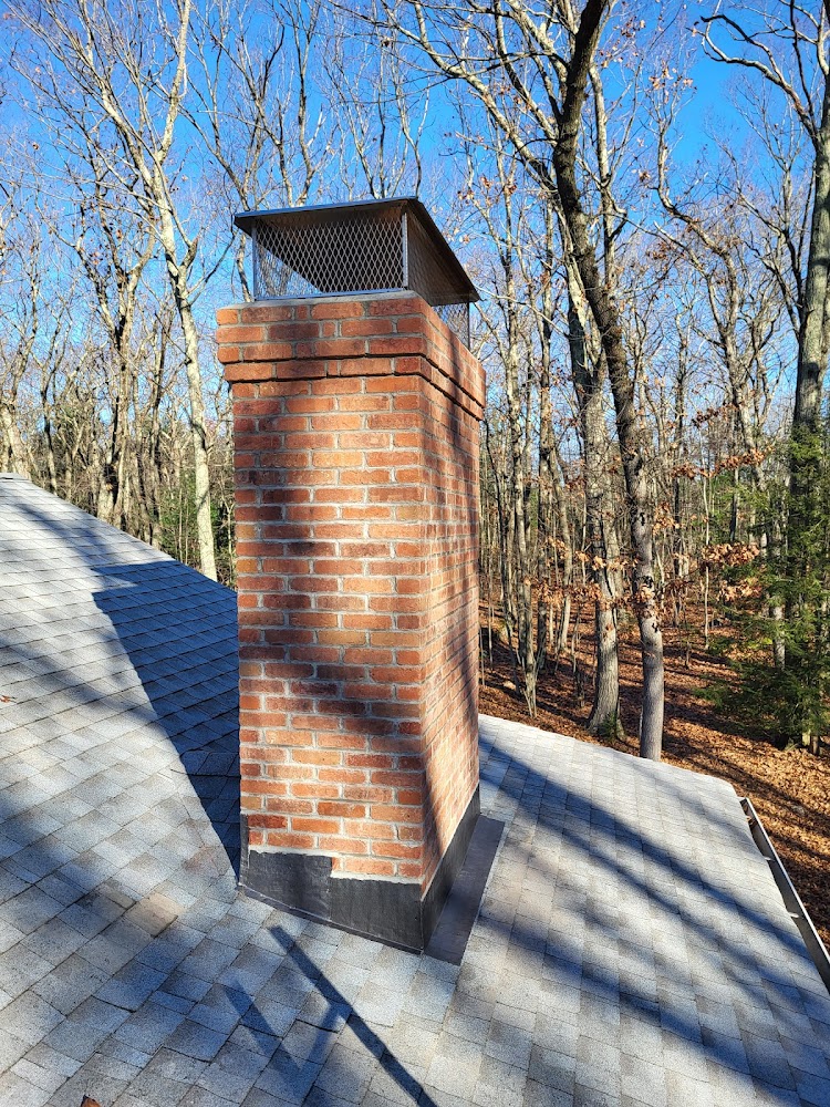 Four Seasons Chimney & Roofing offering chimney services in Thomaston