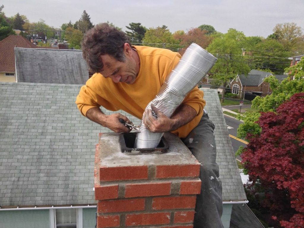 Lura's Sons Home Improvement offering chimney services in Clifton