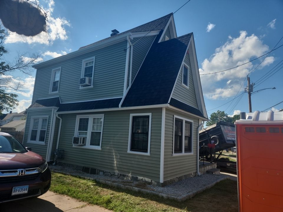 New England Roofing & Home Repair offering chimney services in Orange