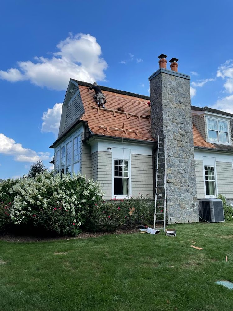 Roofing Long Island offering chimney services in Shirley