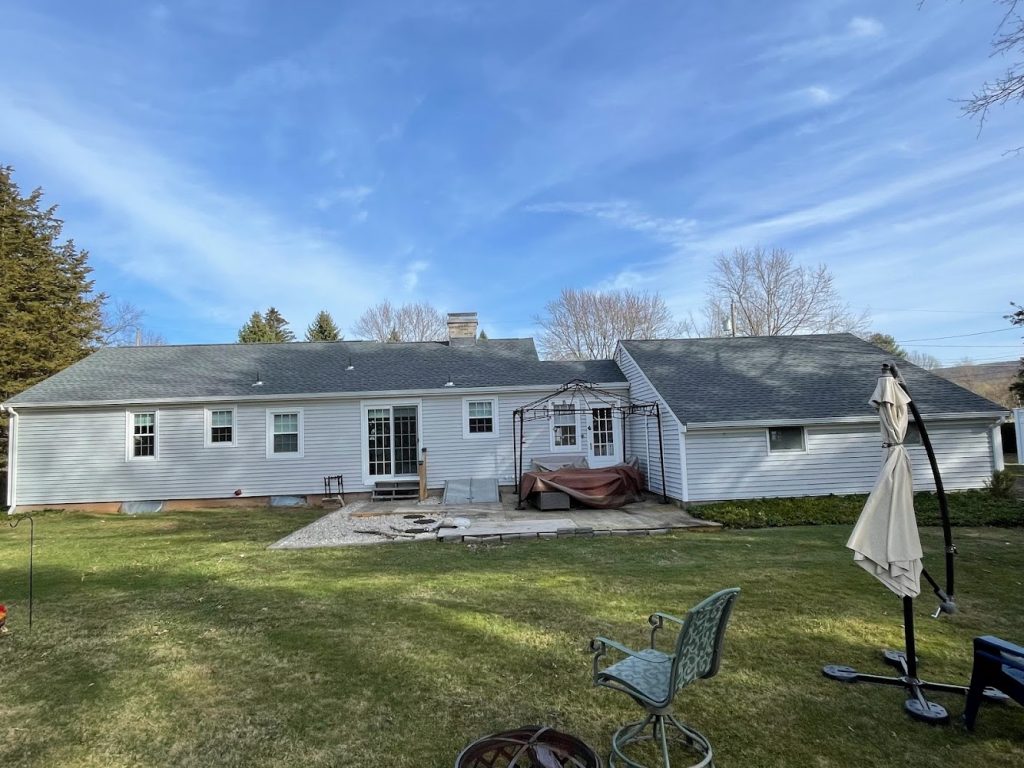 Rubman Construction LLC Roofing & Siding Service offering chimney services in Waterbury