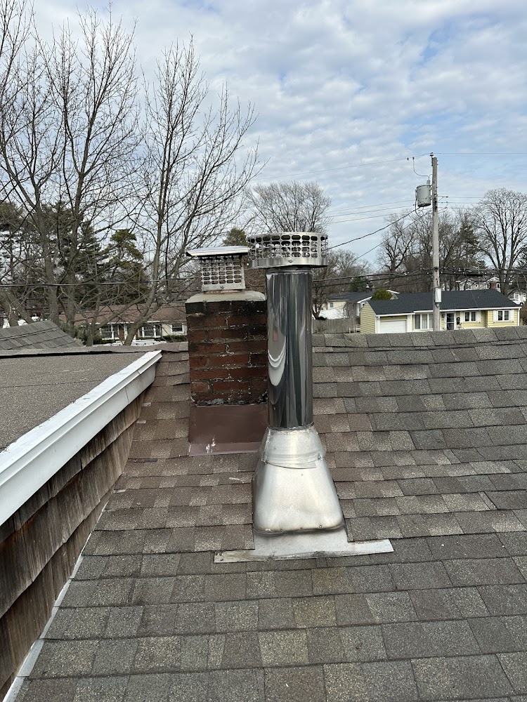 SkyLuxe Construction Inc offering chimney services in Greenport