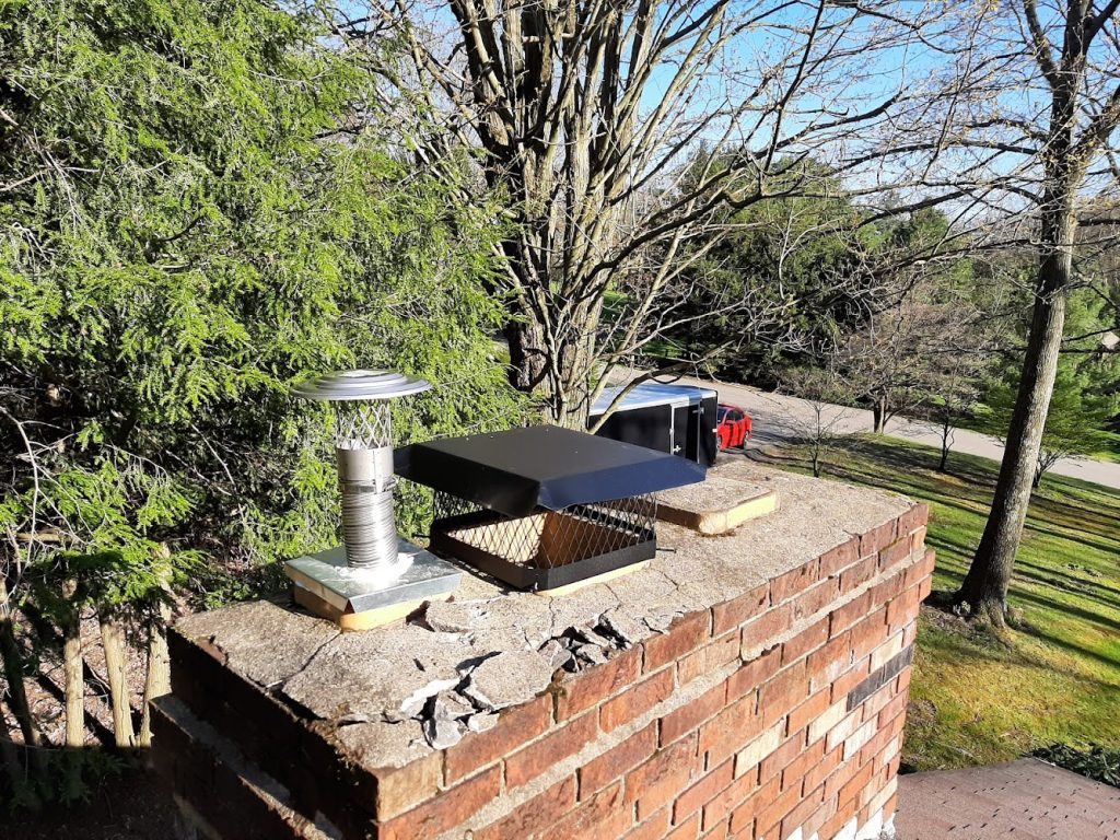 Top Cat Chimney Sweep And Service offering chimney services in Kittanning
